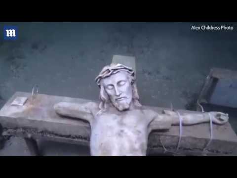 Stunning video of underwater crucifix in frozen Lake Michigan