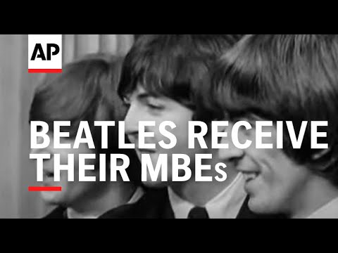 The Beatles receive their MBEs - Beatlemania scenes!