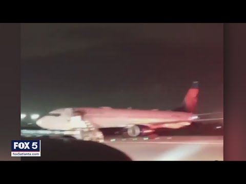Panic on planes after images are AirDropped to passengers