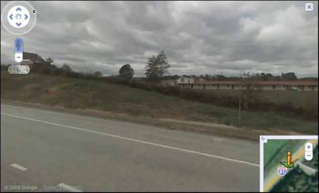 Google Maps Street View of a red-roofed motel