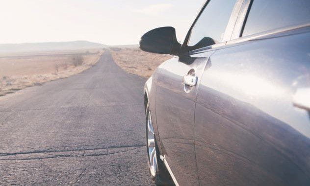 Car on desert road