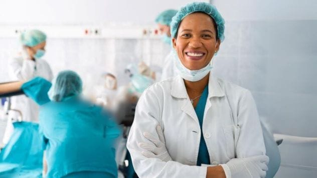 Evelyn Greenhill wearing a white coat