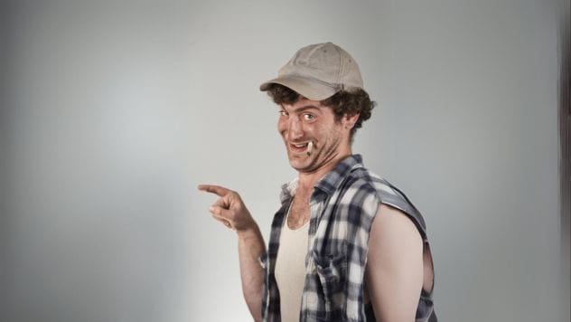 A person walking through a muddy field.