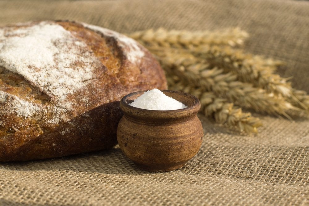 Sin eater ritual with bread and salt