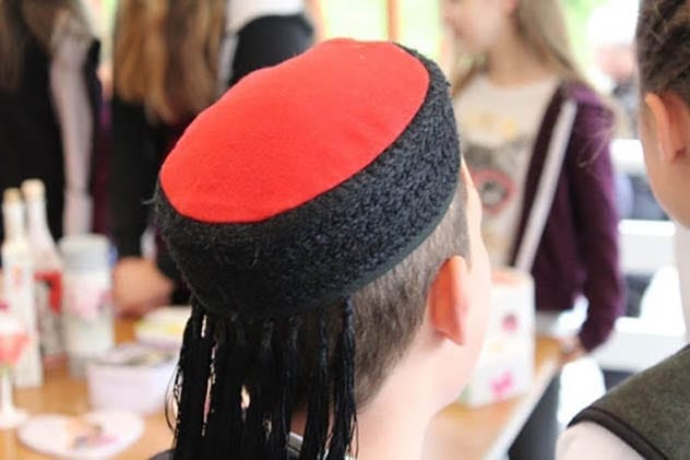Man wearing a Croatian Lika cap