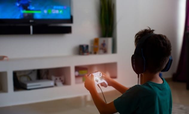 boy playing video games