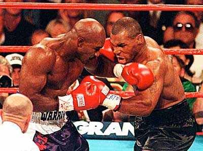 Mike Tyson biting Evander Holyfield's ear