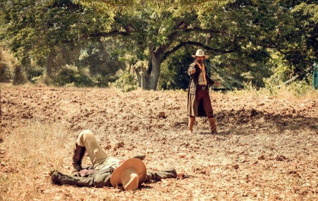 A close up of a vintage pistol.