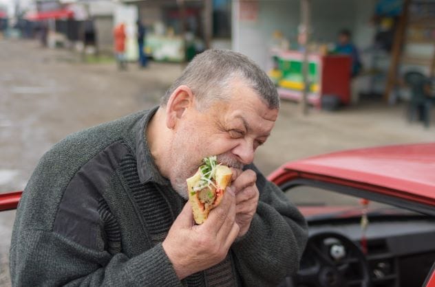 People eating and 'chowing down'.