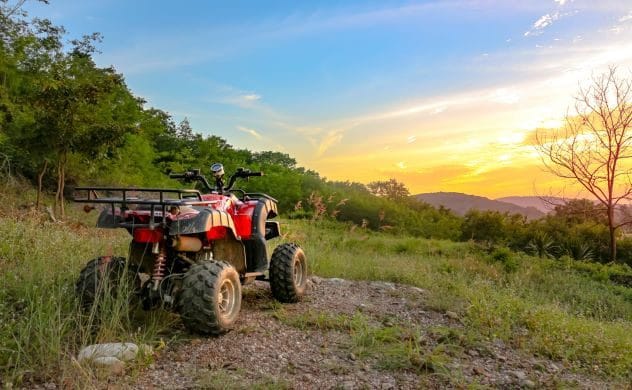 A person riding an ATV, symbolizing Tony Choate's last known activity