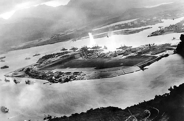 Japanese planes attacking Pearl Harbor, a pivotal moment in WWII