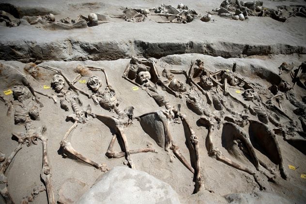Mass grave of shackled men
