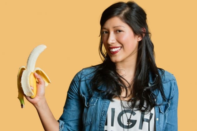 A person peeling a banana
