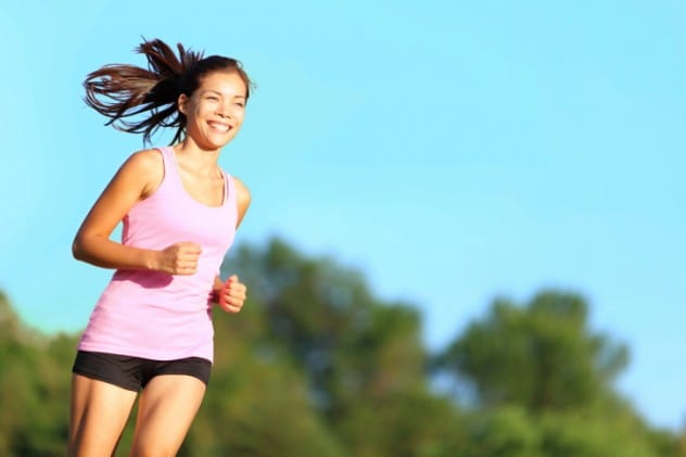 Person energetically exercising outdoors