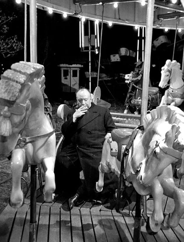 Alfred Hitchcock on the set of Strangers on a Train