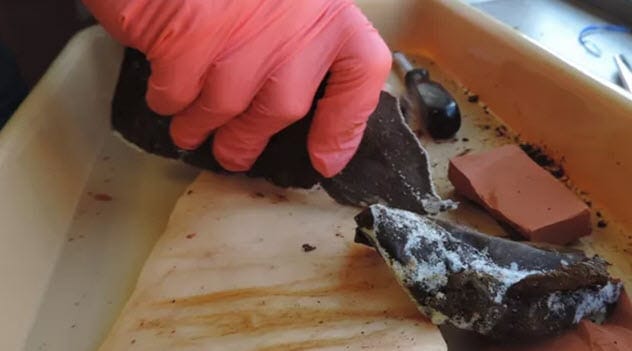 A knife made of frozen feces