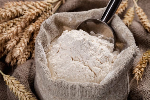 Flour falling into a pile
