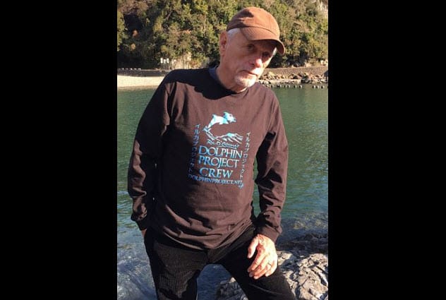 Ric O'Barry with a dolphin