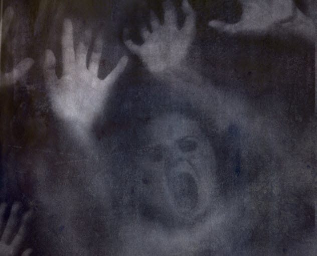 A dimly lit, spooky corridor, suggesting a ghostly presence