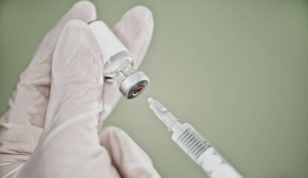 A historical image representing a penicillin injection.
