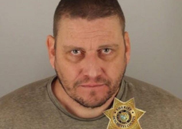Man with gun at birthday party