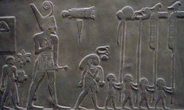 Sandal-Bearer attending to his master