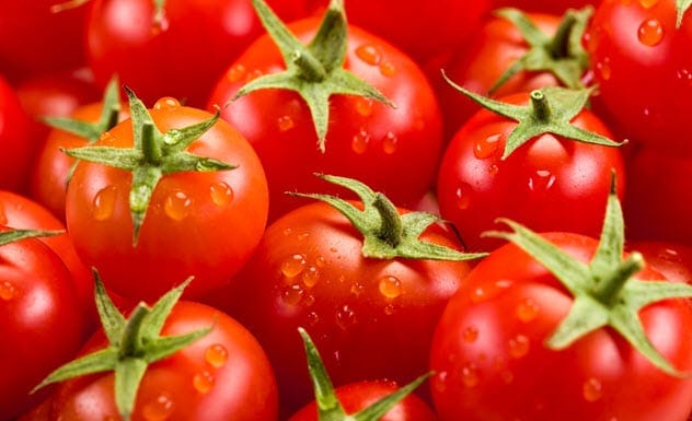 Fresh red tomatoes in a basket