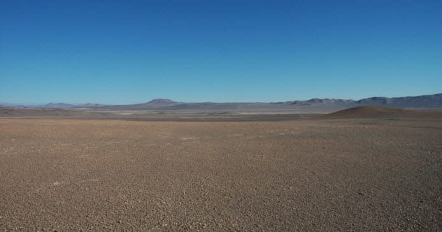 Desert landscape, symbolizing environmental impact and climate change