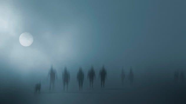 A ghostly apparition in a graveyard