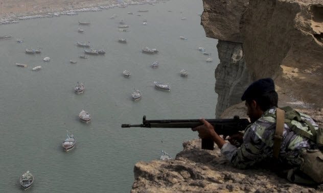 Iranian soldier guarding Strait of Hormuz