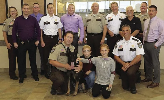 Josie Larson with K-9 unit officers