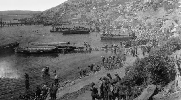 A historical depiction of soldiers in a trench during a battle