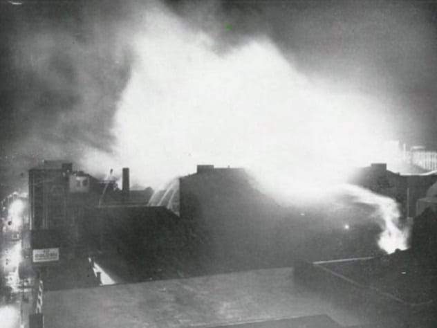 Firefighters battling the massive blaze at the Glasgow whiskey distillery in 1960