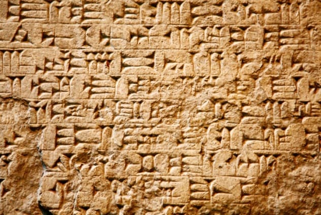 Ancient cuneiform script on a clay tablet
