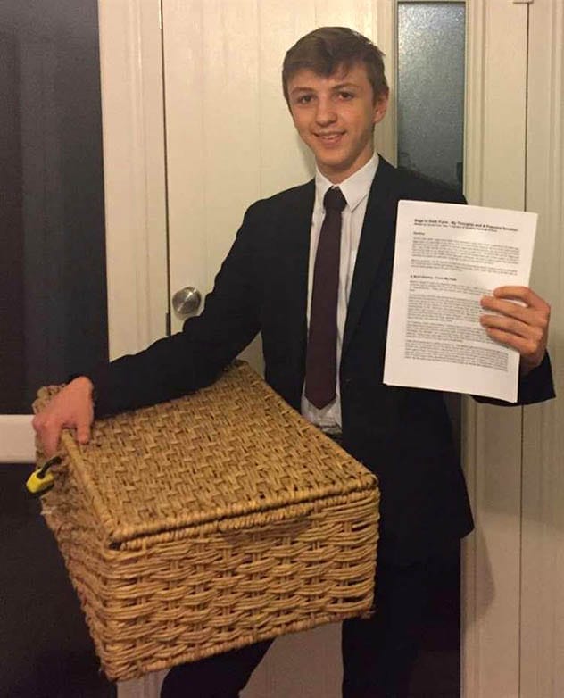 Student protesting backpack ban with microwave