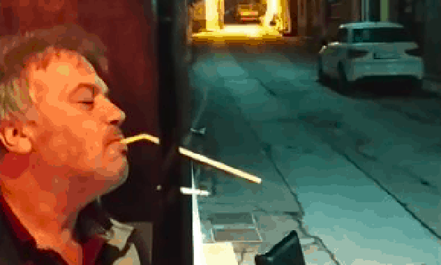 Greek man exploiting smoking ban