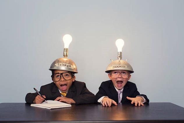 Two illustrated figures with lightbulbs above their heads, symbolizing shared bright ideas.