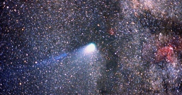 Halley's Comet with its tail visible in the night sky