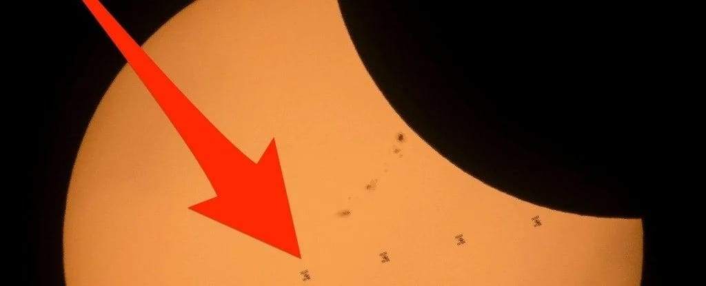 ISS passing in front of the sun during an eclipse