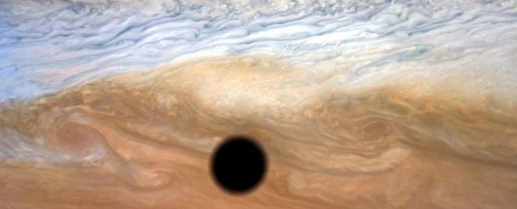 Io passing between the Sun and Jupiter