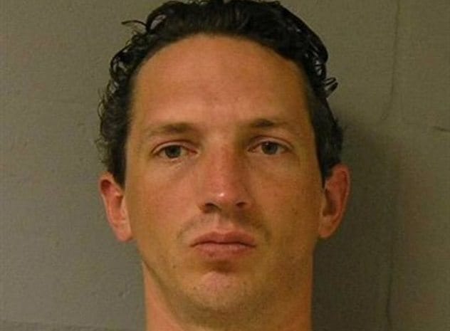 Israel Keyes smiles slyly