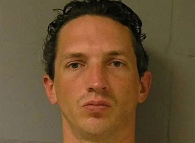 Israel Keyes smiles slyly