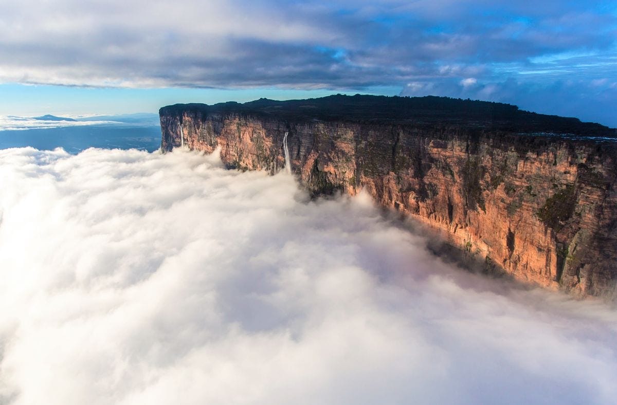The flat-topped Mount Roraima, known as the 'floating island of Venezuela', surrounded by clouds.