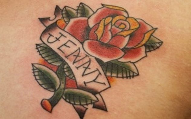 Partially completed matching tattoo on someone's arm