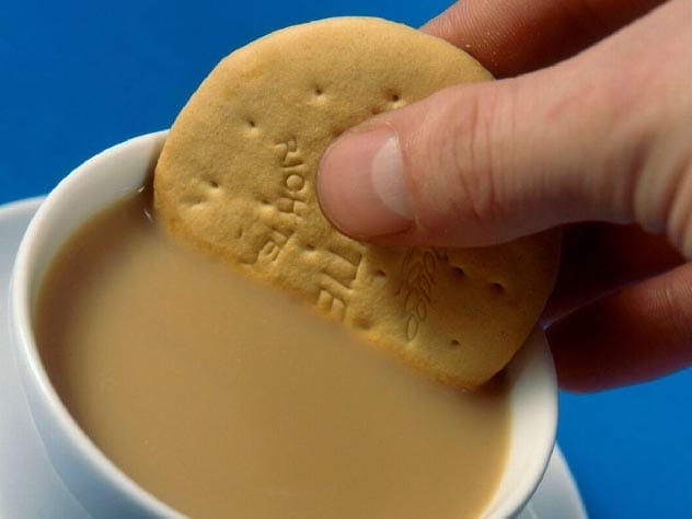 Tea being dunked.