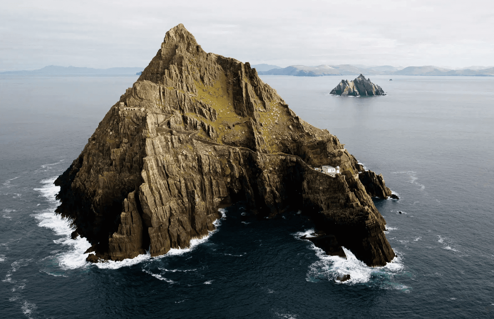The dramatic island of Skellig Michael off the coast of Kerry, Ireland, featuring an ancient monastery and Star Wars filming location.