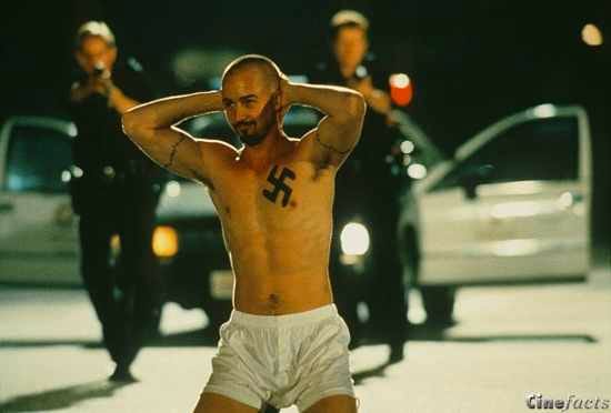 Scene from American History X, hinting at violence often shown off-screen