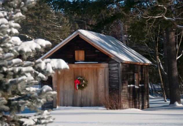 An old farmhouse in winter representing the Rooney home