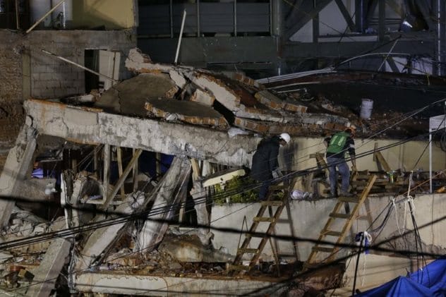 Rescue workers at a collapsed school in Mexico City