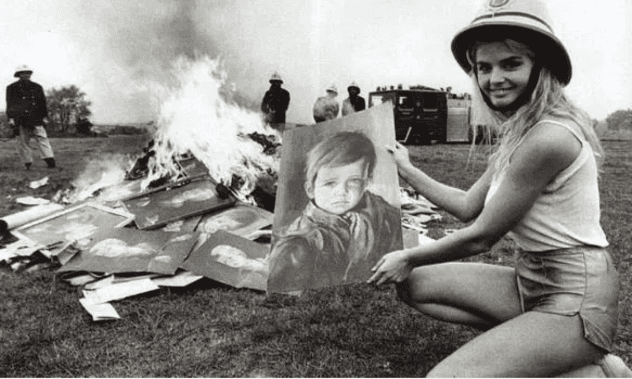 Image depicting a large bonfire of Crying Boy paintings